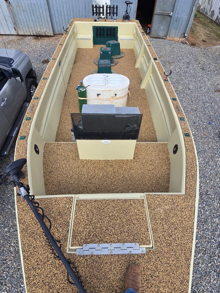 Overhead view of our Lake Texoma striper boat—open deck, center console, rod holders, and room for a full day on the water.